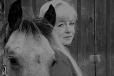 Sharine on her Ranch with "little Buck" 10 month old